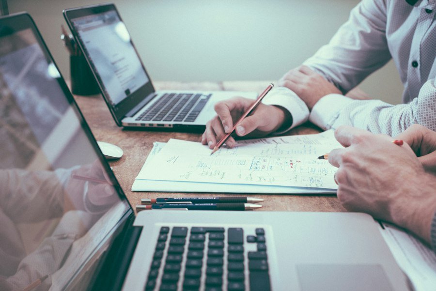 Business team preparing professional company profile documents